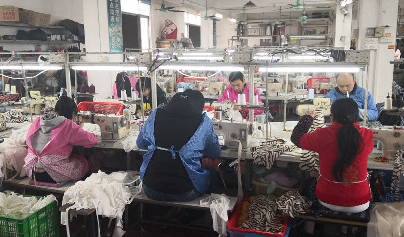 Guangzhou Beianji Clothing Co., Ltd. línea de producción del fabricante